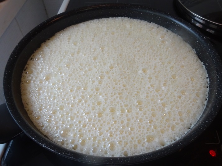 Pour the dough into the pan and fry